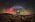 Geminid Symphony Over La Palma’s Guardian of the Sky